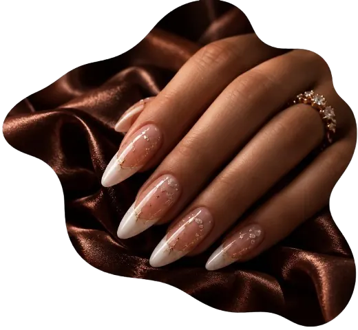French manicure with gold glitter on brown satin